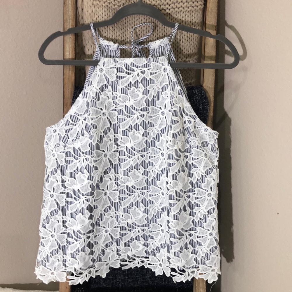 Halter top size S. Adiva Crocheted lace with navy striped lining